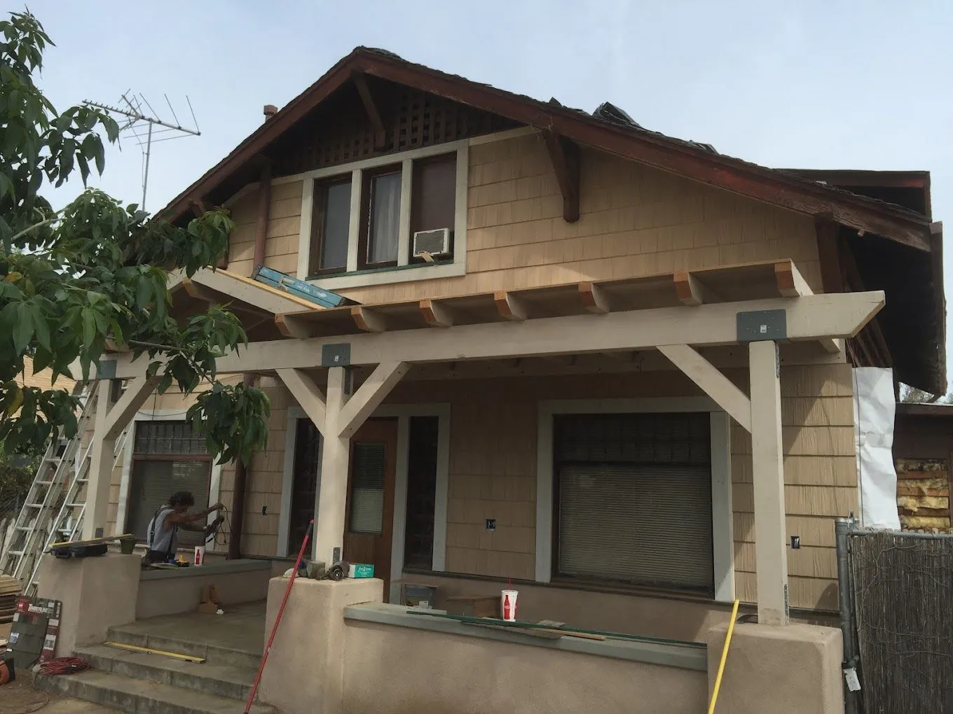 Front porch of a residential home featuring a newly constructed wood patio cover, showcasing BPP Construction's craftsmanship in wood construction and repair services in San Bernardino County.