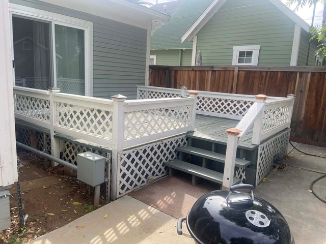 Custom elevated wood deck with lattice railing, adjacent to a residential home in Riverside, CA, showcasing BPP Construction's craftsmanship.